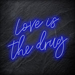 "Love is The Drug" LED Neonschild Sign Schriftzug - NEONEVERGLOW
