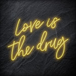 "Love is The Drug" LED Neonschild Sign Schriftzug - NEONEVERGLOW
